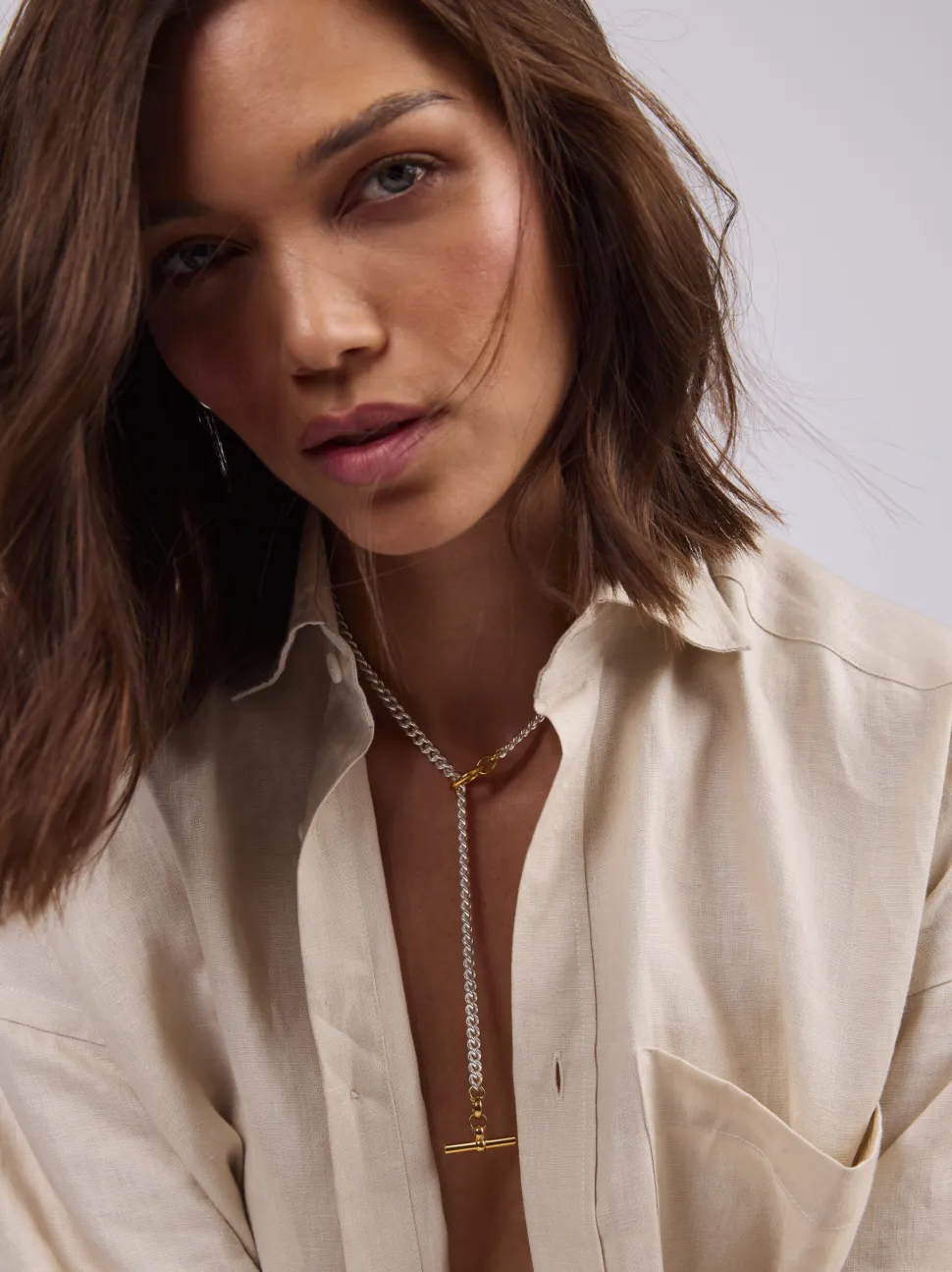 Small Gold T-Bar Clasp On Silver Curb Link Necklace