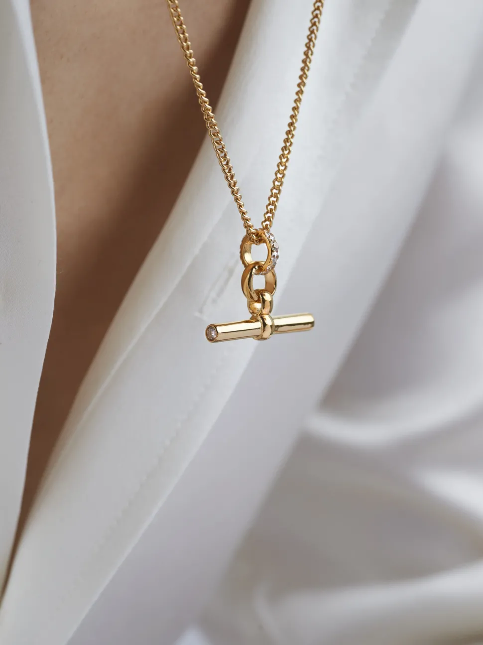 Small Jewelled Gold T-Bar On Fine Curb Chain